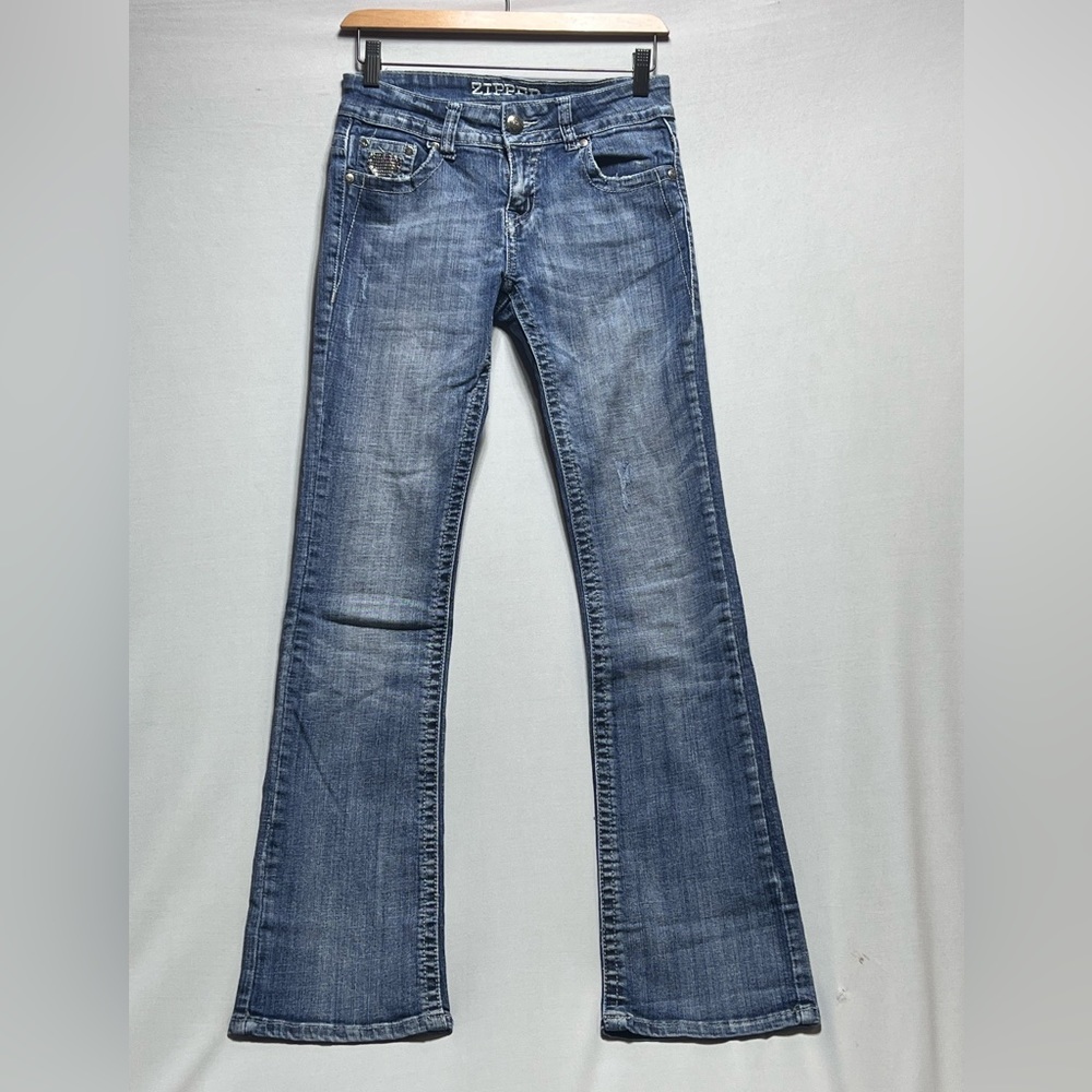 Women’s zipper blue jeans, size 9 with sparkly pockets